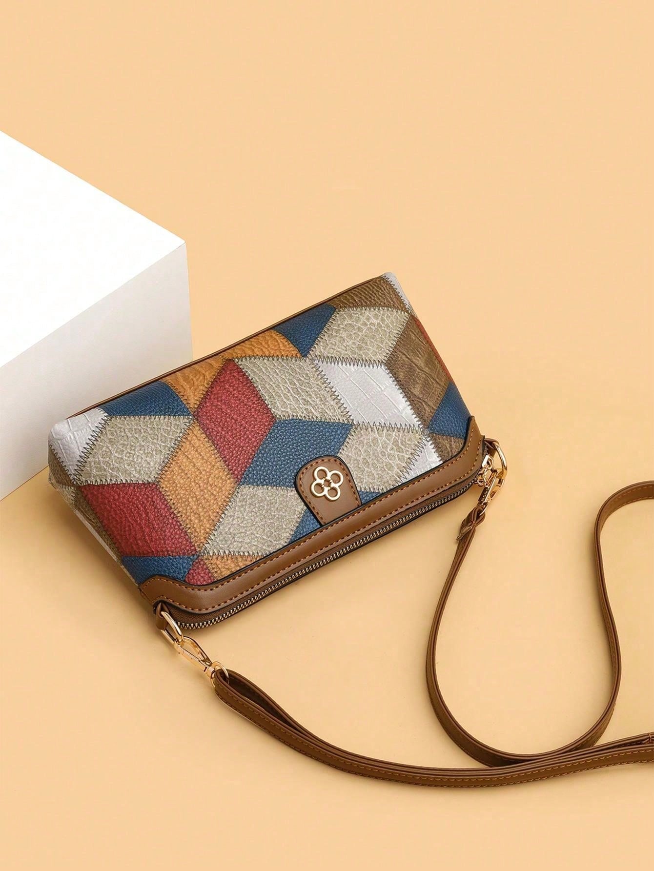 Bolsa feminina estilo retrô com estampa floral e alça caramelo